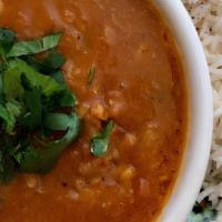Daal Challow · Vegan. Slow cooked seasoned lentils with white basmati rice.