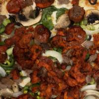 Afghani Pizza · Pizza made with choice of chicken or ground beef, mushroom, tomatoes, bell peppers, onion, f...