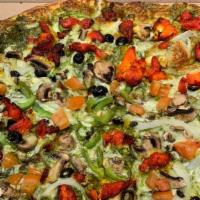 Pesto Chicken Pizza · Chicken mushroom,bell peppers, onion, fresh tomatoes, fresh garlic with pesto sauce.