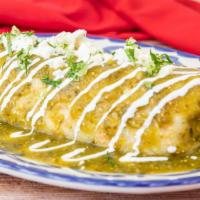 Burrito Mojado · Asada or chicken, Mexican rice, pinto beans, mozzarella cheese, lettuce,covered in red or gr...