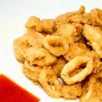 Crispy Calamari · Tempura battered, served with sweet &  sour sauce.