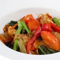 Pad Kee - Mao (Drunken Noodles) · Pan-fried wide rice noodles with basil, chili, and Chinese broccoli.