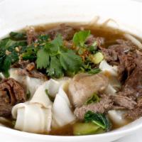 Beef Noodle Soup · Traditional style Thai beef noodle soup with special braised beef and Chinese broccoli.