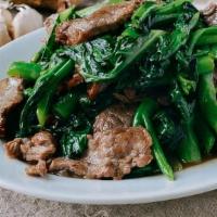 Sautéed Chinese Broccoli · Sliced beef, chicken, pork with Chinese broccoli sautéed in a rich garlic sauce.
