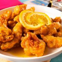 Orange Blossom Chicken · Battered and cooked in a sweet orange sauce.