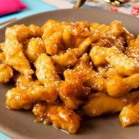 Sesame Chicken · Served in a savory sauce served with sesame seeds.