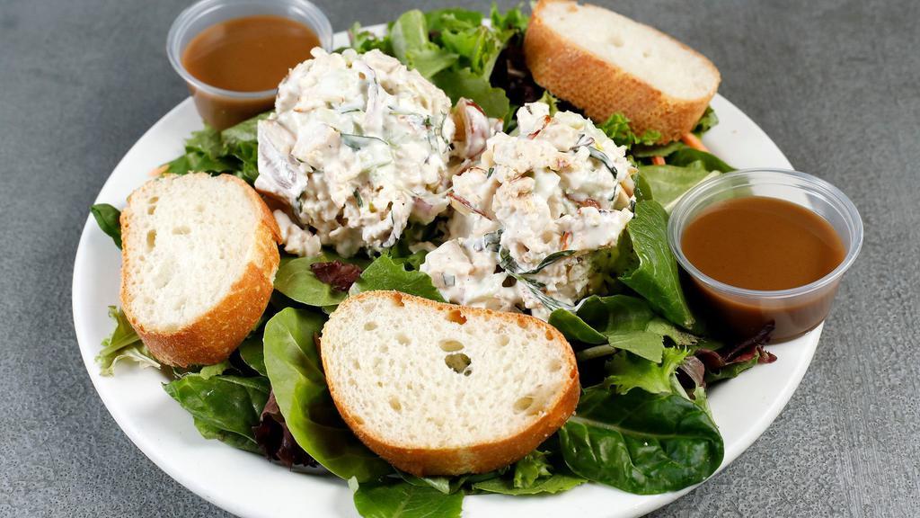 Tarragon Chicken Salad · Served on a bed of mixed field greens in a light balsamic vinaigrette dressing.