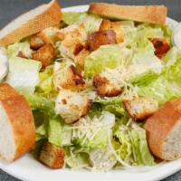 Caesar Salad · Romaine lettuce, egg less Caesar dressing, croutons & parmesan cheese.