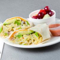 Breakfast Burrito · Scrambled egg with bacon, ham, Sausage, or vegetable with cheese. Include fruit salad.