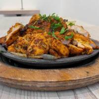 Grilled Chicken Boti Sizzler Chicken Sizzler Large · Charcoal grilled boneless chicken, deep-marinated with our herb-spice blend.  

[Dairy-Free,...