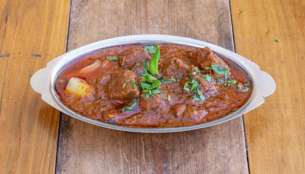 Lamb Gosht (Lamb Stew) · Slow braised, grass-fed Australian lamb and potatoes in a rich, aromatic gravy of caramelized onions & traditional spices. 

[Nut-Free, Egg-Free, Gluten-Free]