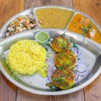 Aloo Tikki (Potato Cutlet) Thali · Meal includes Rice, Daal Lentil, and Chopped Pickled Salad with Tamarind Chutney. Spiced Pot...