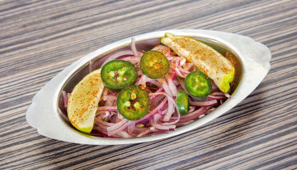 Piyaaz Salad 8 Ounces · Raw red onions, chopped Jalapeños and lime wedges with a sprinkle of our home-made chaat masala.

[Gluten-Free, Vegan]