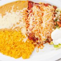2 Enchilada Plate · Rice, fried bean, pico de gallo, lettuce & sour cream.
choice of meat, beef, chicken, carnit...