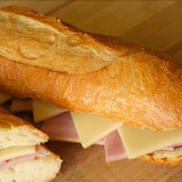 Ham & Swiss Parisian · Ham and Swiss cheese with butter on a freshly baked baguette.