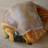 Spinach & Cheese Croissant · A freshly baked croissant hand rolled with spinach and cream cheese and topped with Swiss ch...