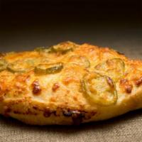 Jalapeño Bread · Baguette dough stuffed with pizza sauce, cheddar cheese, mozzarella cheese, and jalapeños.