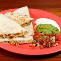 Quesadilla Meat · Quesadilla with your choice of meat, Includes sour cream, guacamole and salsa fresca on the ...
