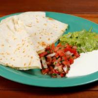 Cheese Quesadilla · Cheese quesadilla with sour cream, guacamole and salsa fresca on the side.