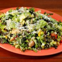 Lulu's Chopped Salad - Large · Mixed lettuce, napa cabbage, bell peppers, corn, avocado, tomato, pepitas, Mexican cheese, t...