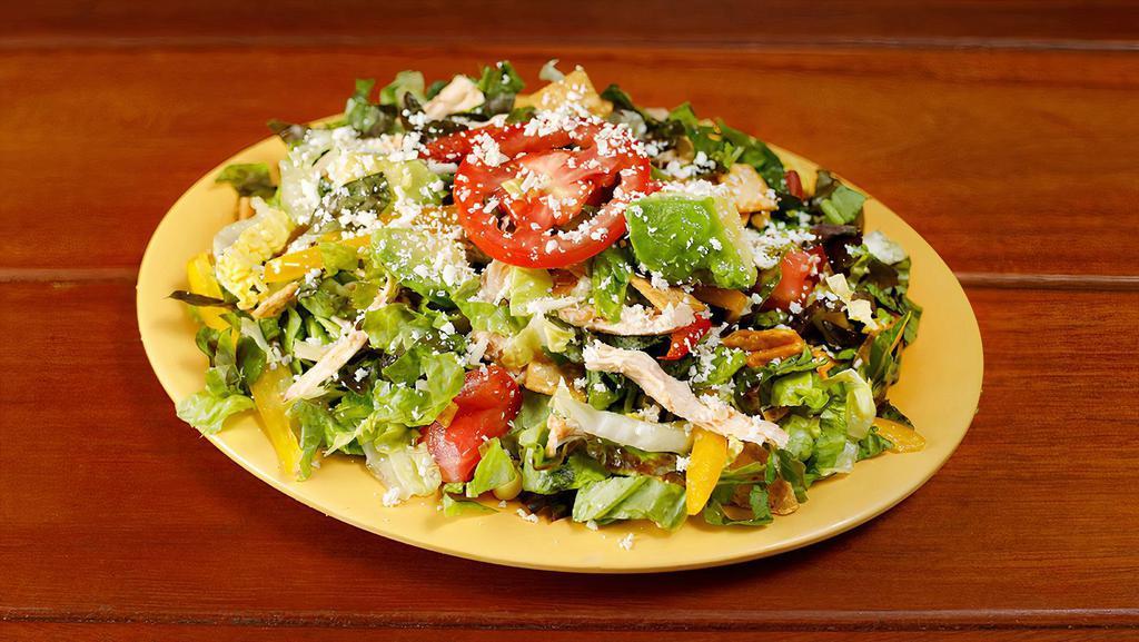 Lulu's Chopped Salad - Small · Mixed lettuce, napa cabbage, bell peppers, corn, avocado, tomato, pepitas, Mexican cheese, tortilla chips with a cilantro dressing. Add chicken, beef, pork, or seafood to your salad.