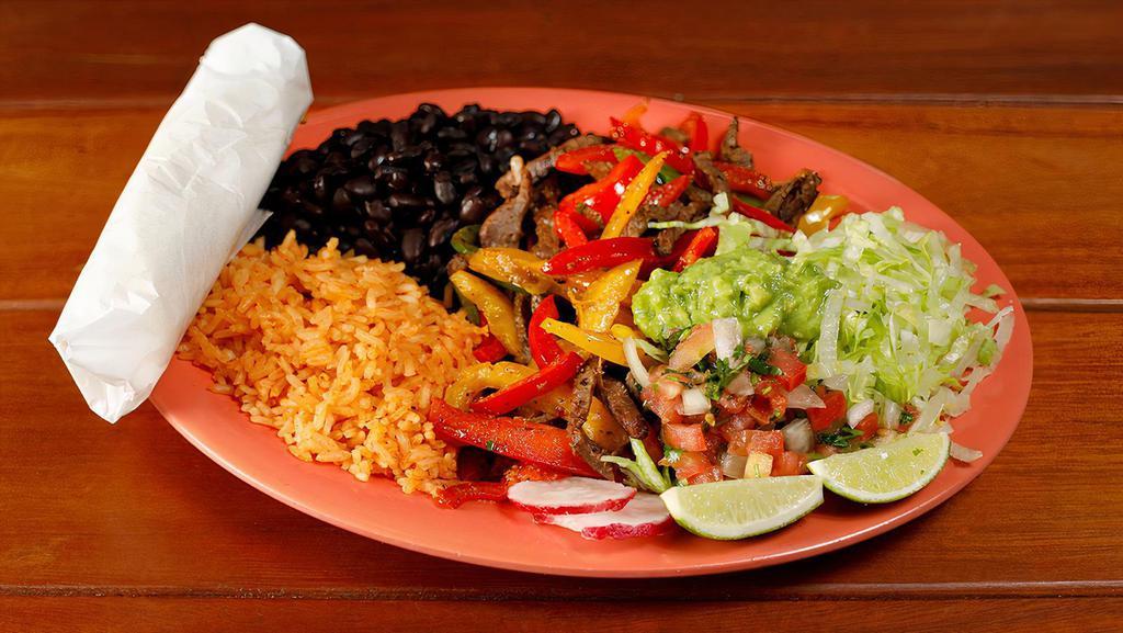 Steak Fajita Plate · Beef sautéed with bell peppers and onions.
