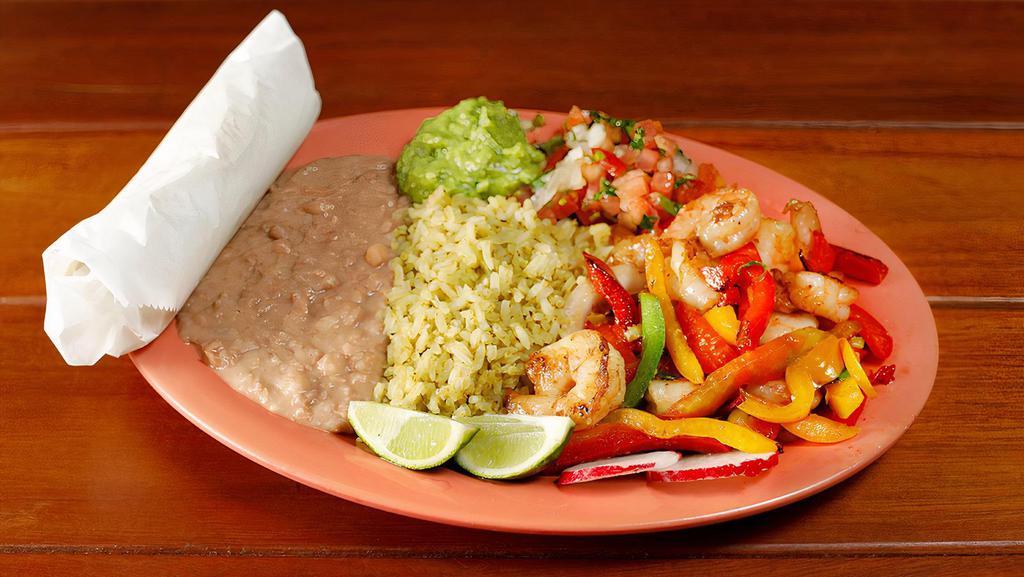 Regular Shrimp Fajita Burrito · Grilled shrimp sautéed with bell peppers and onions, your choice of beans, and rice, Monterey jack cheese, salsa fresca, guacamole, and sour cream.