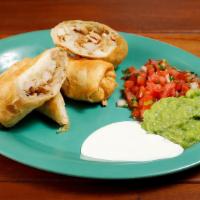Chimichangas · Two crispy flour burritos filled with cheese and your choice of meat, served with salsa fres...
