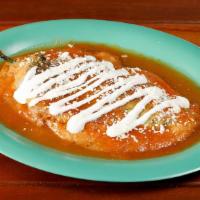 Chile Relleno (1) · Roasted pasilla pepper stuffed with monterey jack cheese topped with salsa caliente, Mexican...