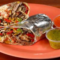 Regular Steak Fajita Burrito · Steak sautéed with bell peppers and onions, your choice of rice, and beans, Monterey jack ch...