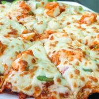 Paneer Tikka Masala Pizza · Vegetarian delight! Fresh tikka masala sauce as the base topped with masala paneer, chopped ...