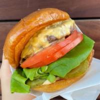 Cheeseburger · single patty with everything(lettuce,tomato,grilled onion ,pickles )and cheese