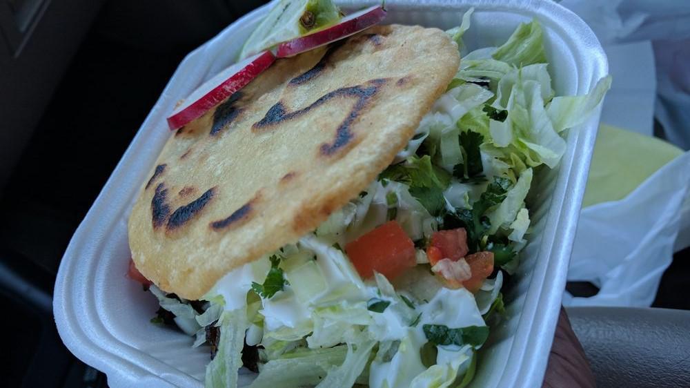 Gorditas · Choice of meat, beans, onion sauce, lettuce, and cheese.