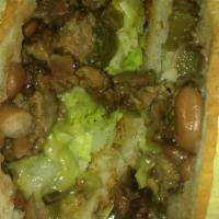 Torta King David · With Beans, asada, ham, bacon, sausage, lettuce, tomato, fresh cheese, avocado, jalapeno, an...
