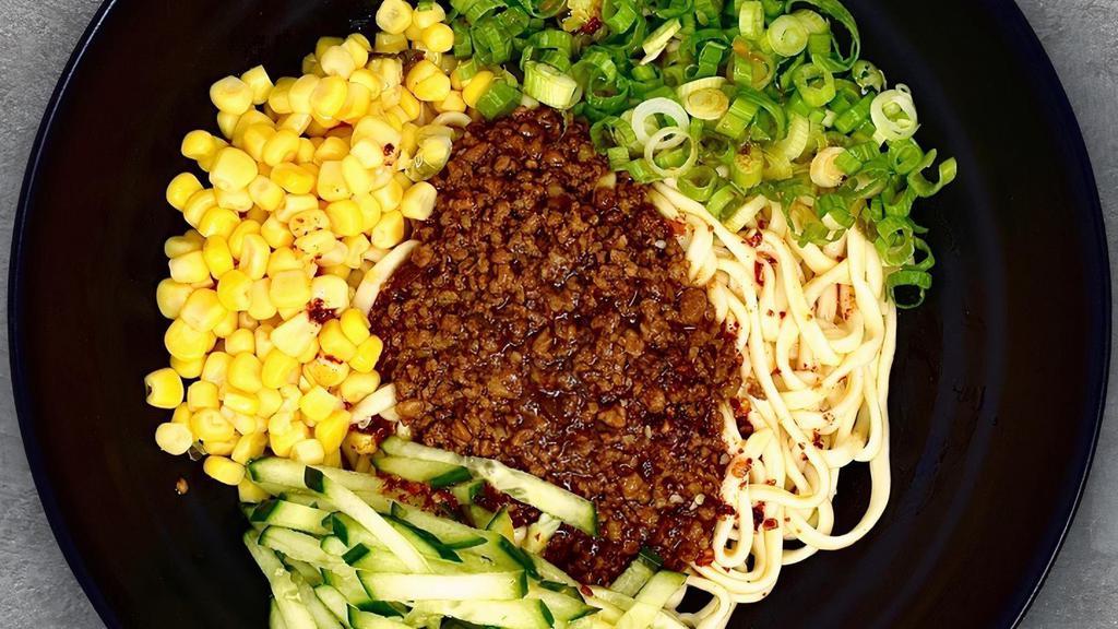Zha Jiang Mian 秘制炸酱 · Pork meat sauce cooked with sweet soy paste, topped with corn, green onion and cucumber. (Dry Only) / Cal. 460
