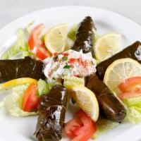 Dolma · Grape leaves stuffed with rice, assorted herbs and spices