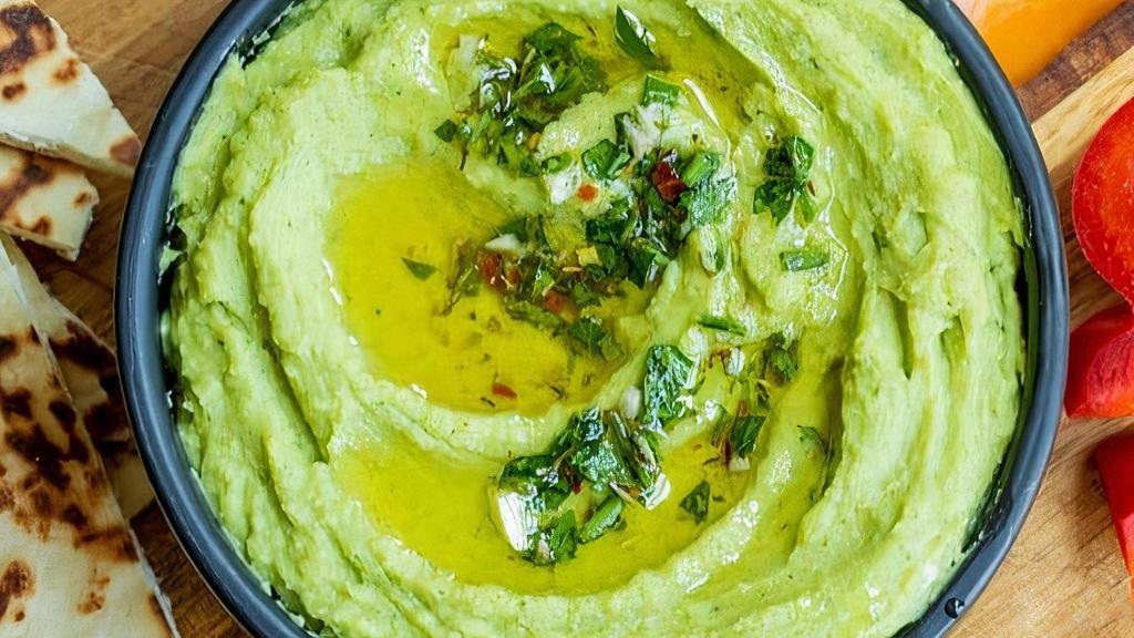 Hummus Avocado · A delightful dip of garbanzo beans, avocado, tahini, garlic, lemon juice, and olive oil. Appetizer comes with pita bread