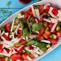 Shepperd Salad · Chopped tomato, onion, parsley, green pepper are mixed and served with special sauce.