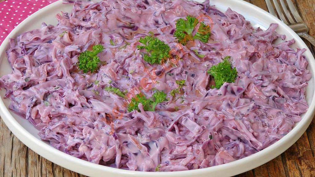 Red Cabbage w Yoghurt SALAD · Garlic yoghurt, mayonnaise, boiled corn and pickled cucumbers are added to the red cabbage cooked in olive oil and served.
