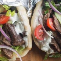 Lamb & Beef Gyro PITA · Daily cut and cooked lamb and beef meat gyro, tomatoes, cucumber, romaine hearts, tzatziki s...