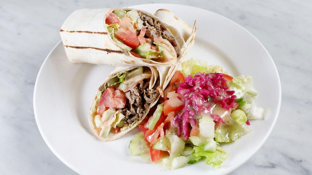 Lamb & Beef Gyro Wrap · Daily cut and cooked lamb and beef meat gyro, tomatoes, cucumber, romaine hearts, tzatziki sauce wrapped in lavash bread and optional side of hot sauce(1.5oz)