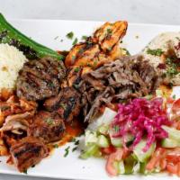 Mediterranean Combo Plate · Lamb and chicken shish kebab, kofta kebab, lamb, beef, and chicken gyros. Served with rice, ...