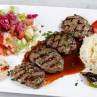Kofte Kebab Plate · Charbroiled ground Lamb and beef, rice, hummus and salad(tomatoes, cucumber, romaine hearts)...