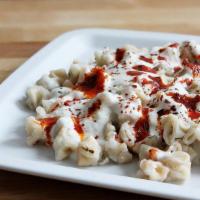 Manti with Beef · Dumplings with beef inside. serving with Yoghurt topping