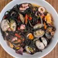 Spaghetti Neri · Black ink squid spaghetti, squid, clams and cherry tomatoes.