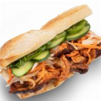 Spicy Pork Sandwich · Comes with pickles carrots and daikon, cucumber, garlic aioli, jalapeno optional.