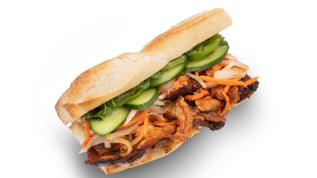 Spicy Pork Sandwich · Comes with pickles carrots and daikon, cucumber, garlic aioli, jalapeno optional.
