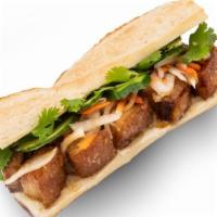 Crispy Pork Belly Sandwich · 24-hour sous vide soy-garlic ginger glaze pork belly. Comes with pickles carrots and daikon,...