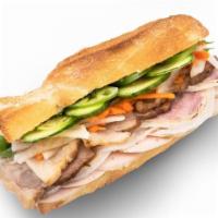 The Vietnamese Classic Sandwich · Homemade pate, pork roll, head cheese, slow-roasted 5 piece pork. Comes with pickles carrots...