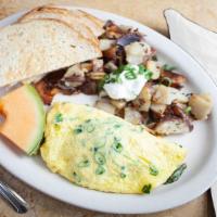 Greek Omelet · Spinach, Feta cheese, green onions, kalamata olives and scallions.
